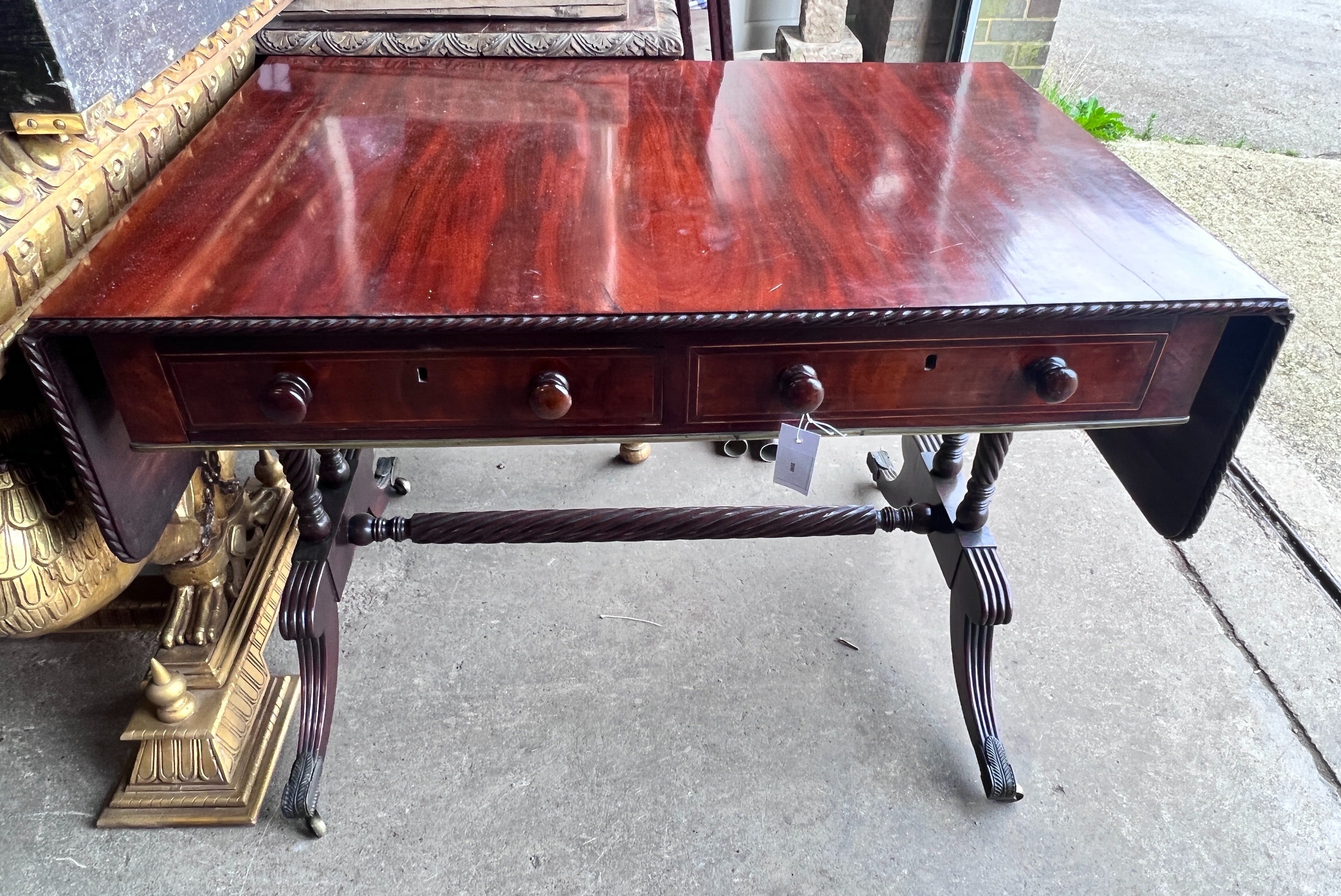A Regency mahogany sofa table, width 100cm, depth 67cm, height 75cm